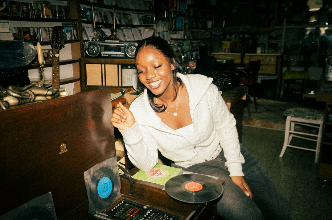Portrait of a woman studio producer smiling